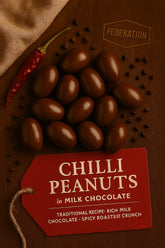 Chilli peanuts in milk chocolate with a red tag on a brown background