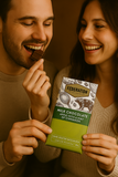 Man and woman enjoying a Federation apple milk chocolate bar together.