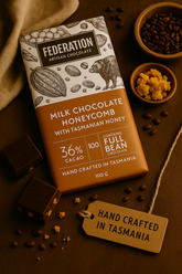 Federation Artisan Chocolate bar with honeycomb and cacao beans on a brown background