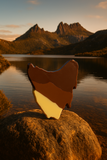 Reflective surface on a rock with Cradle mountain in the background