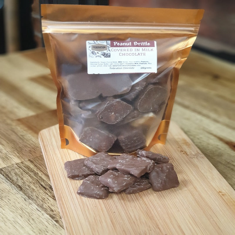 Peanut Brittle dipped in milk chocolate. - Federation Artisan Chocolate